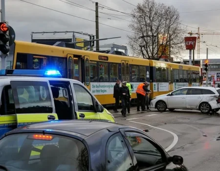 Car accident involving a car and a tram with police officers present at the scene