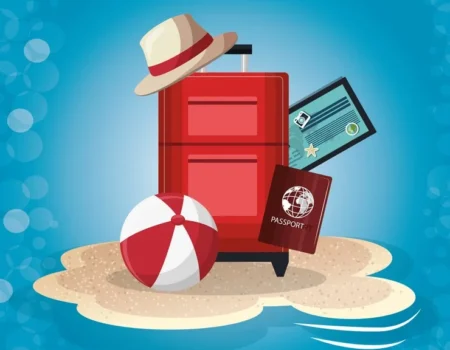 Albino-Monkey.net Travel Archives - Red suitcase with passport, boarding pass, and beach ball on a sandy island, symbolizing sustainable travel adventures.