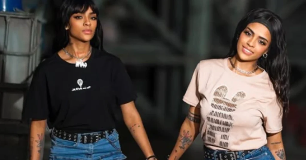 Modeliito Las Mellas showcasing modern Latin American streetwear style in graphic tees and denim, representing twin fashion icons in 2025.