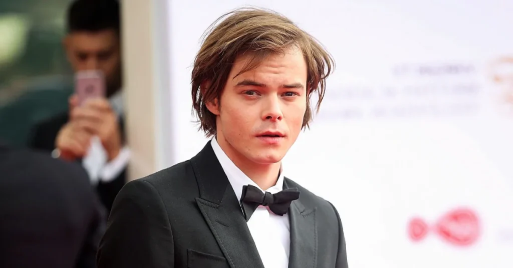 Charlie Heaton at a formal event in black tuxedo - father of Archie Heaton and star of Netflix's Stranger Things series