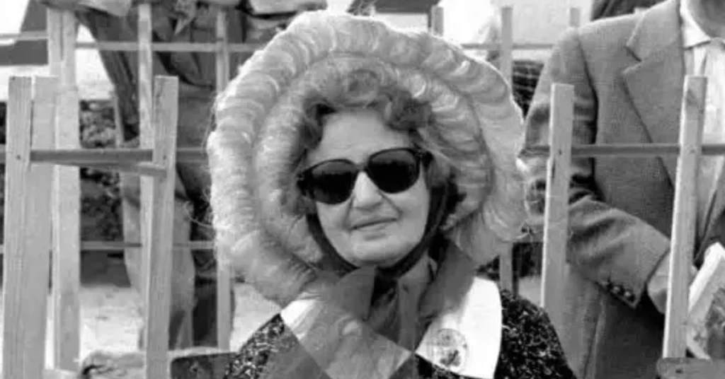 Laura Garello wearing sunglasses and fur-trimmed coat - the woman who helped build Ferrari's legacy through personal sacrifice and business acumen