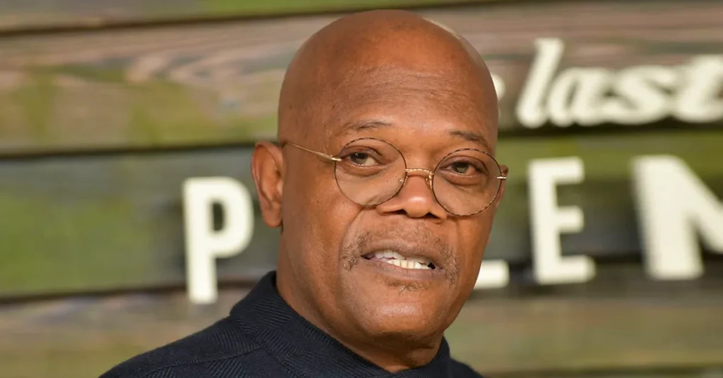 Samuel L. Jackson Net Worth: Samuel L. Jackson smiling confidently at a red carpet event, representing his successful Hollywood career and wealth.