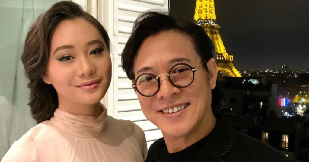 Taimi Li, daughter of Jet Li, smiling with a calm and private demeanor.