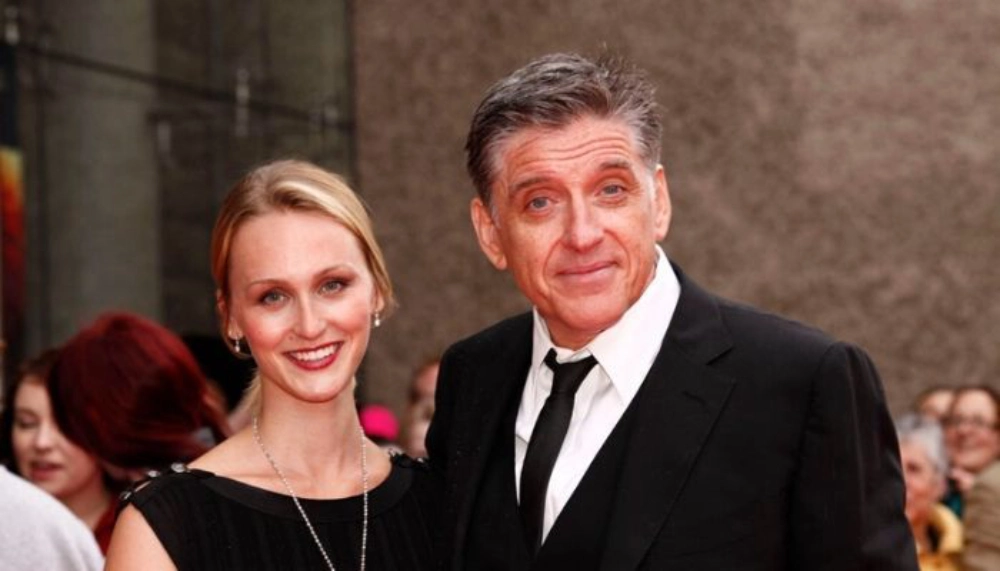 Megan Wallace Cunningham at art gallery event wearing elegant black dress