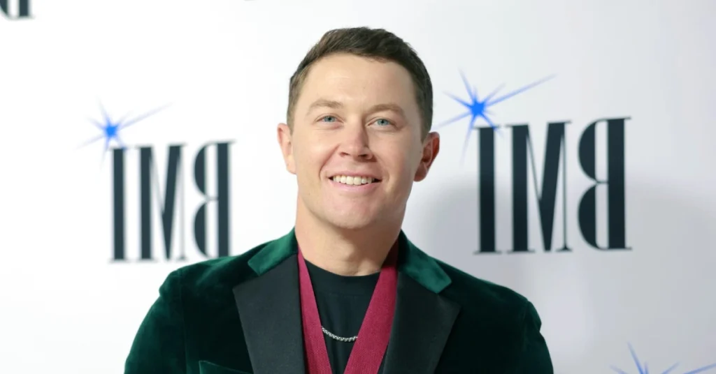 Scotty McCreery at red carpet event showcasing his evolution from American Idol winner to successful Grand Ole Opry member and country music star